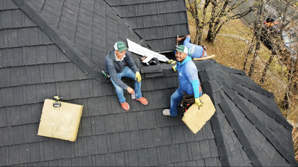 MD Roofing crew working on a residential roof